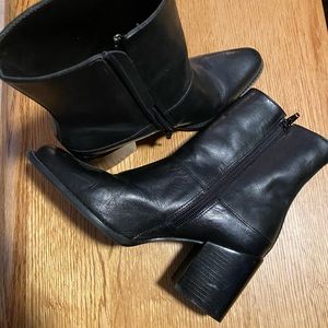 Black leather mid calf bootie.